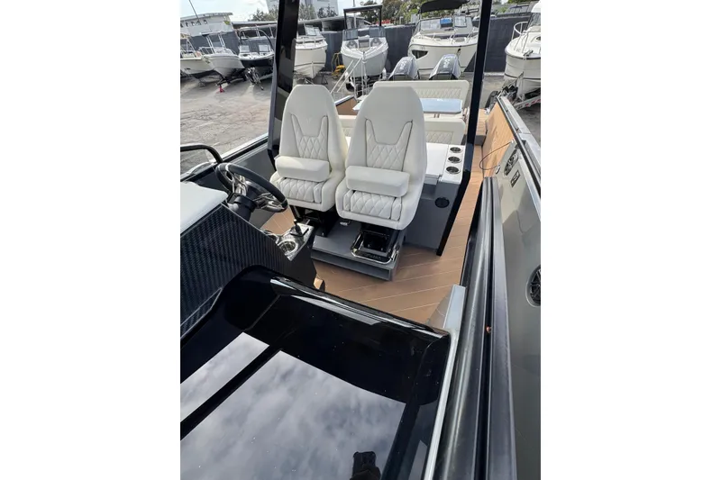 Slide: The Image of Futuristic 2026 Virtue V10 yacht cruising on a sunny day, reflecting clouds on its sleek roof. - 74