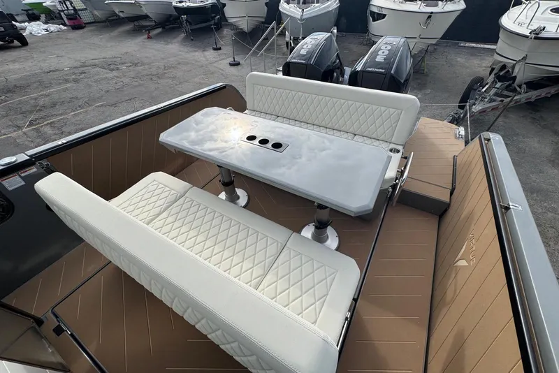 Slide: The Image of Steering wheel and dashboard of 2026 Virtue V10 boat with digital displays. - 77