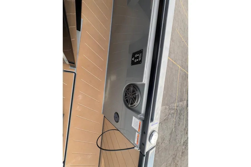 Slide: The Image of Luxury 2026 Virtue V10 boat with sleek design and comfortable seating on calm waters. - 83