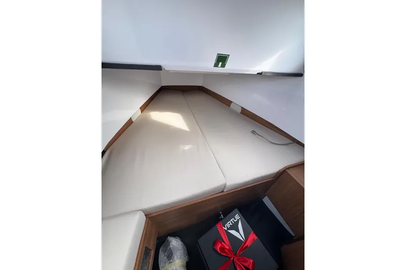 Slide: The Image of Luxurious 2026 Virtue V10 yacht on calm waters under cloudy skies. - 84