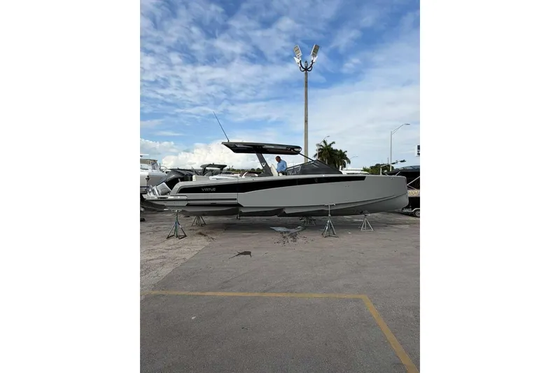 Slide: The Image of Interior of 2026 Virtue V10 boat with modern steering and navigation system. - 90