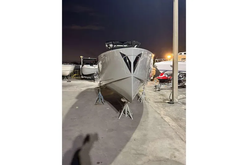 Slide: The Image of 2026 Virtue V10 luxury yacht on calm waters, showcasing sleek design and modern features. - 92