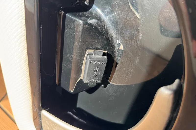 Slide: The Image of Close-up of USB charger port in 2022 South Bay 25 Sport RS9-DC boat. - 18