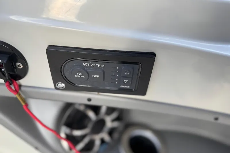 Slide: The Image of Active trim control panel on 2022 South Bay 25 Sport RS9-DC boat. - 27