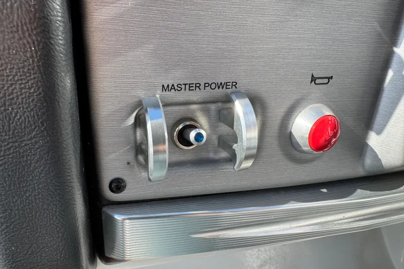 Slide: The Image of Control panel of 2022 South Bay 25 Sport RS9-DC with master power switch. - 42