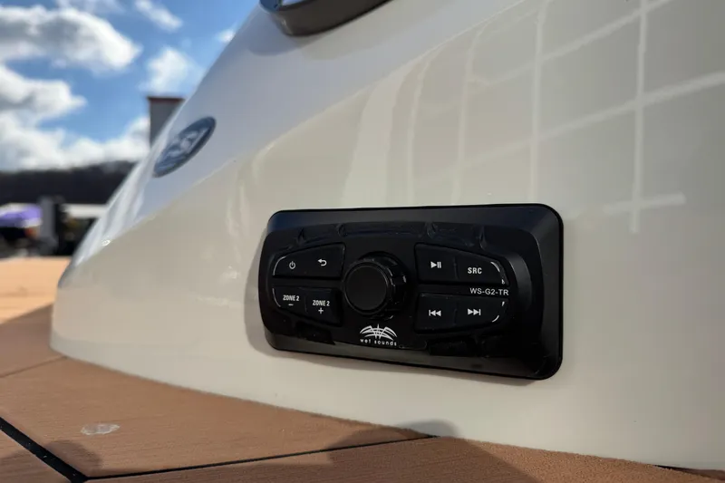 Slide: The Image of Close-up of 2022 South Bay 25 Sport RS9-DC audio control panel on boat exterior. - 43