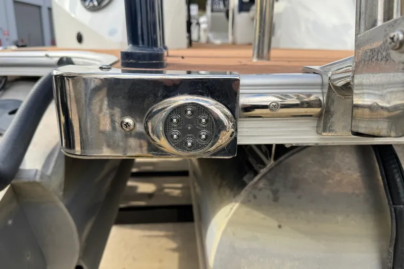 Slide: The Image of Close-up of 2022 South Bay 25 Sport RS9-DC boat's stainless steel stern light. - 6