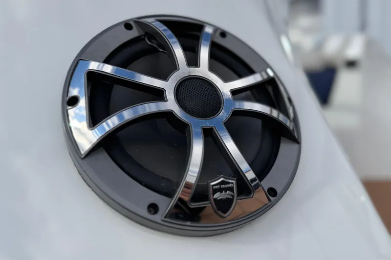 Slide: The Image of Close-up of a speaker on a 2022 South Bay 25 Sport RS9-DC boat. - 9