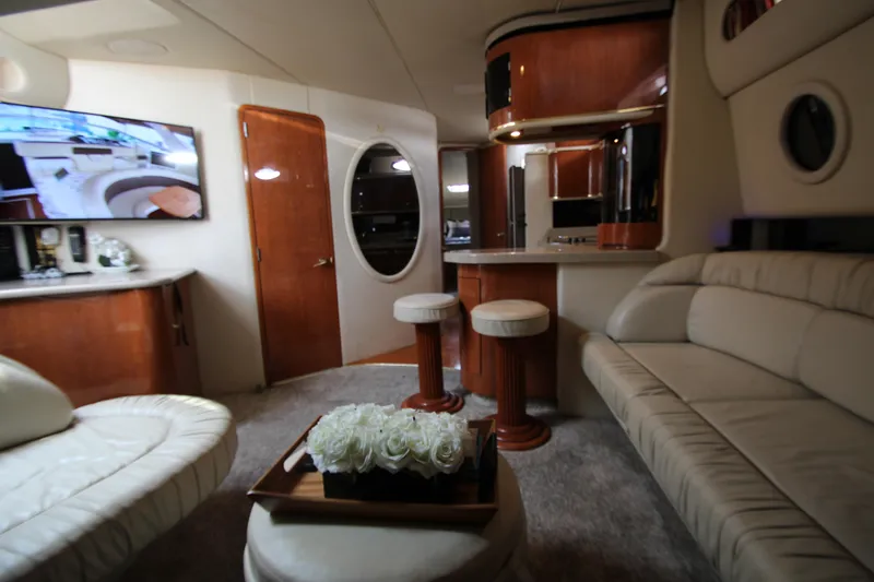 Slide: The Image of Interior of 1998 Sea Ray 500 Sundancer yacht with modern furnishings and decor. - 34