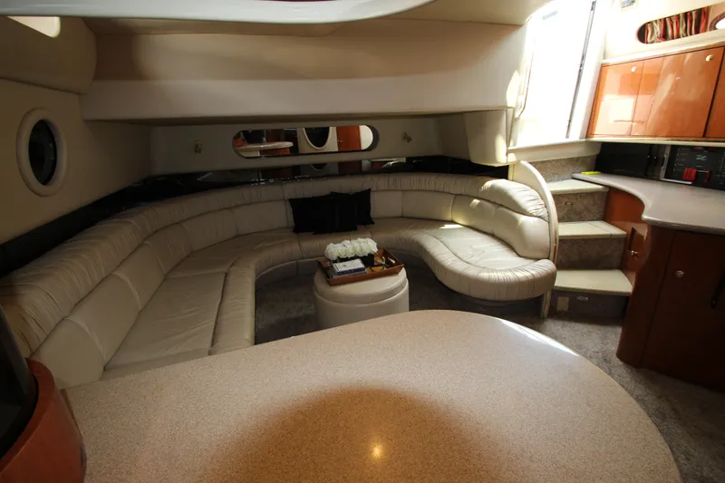 Slide: The Image of Luxurious interior of a 1998 Sea Ray 500 Sundancer yacht with plush seating. - 37