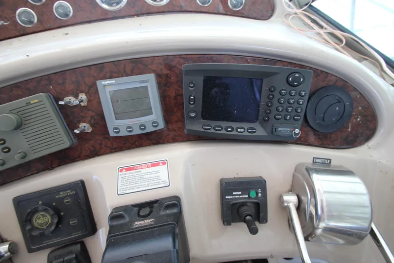 Slide: The Image of Control panel of 2001 Sea Ray 460 Sundancer boat with navigation equipment. - 26
