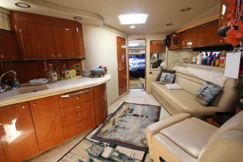 Slide: The Image of Luxurious interior of 2001 Sea Ray 460 Sundancer yacht with elegant wood cabinetry. - 31