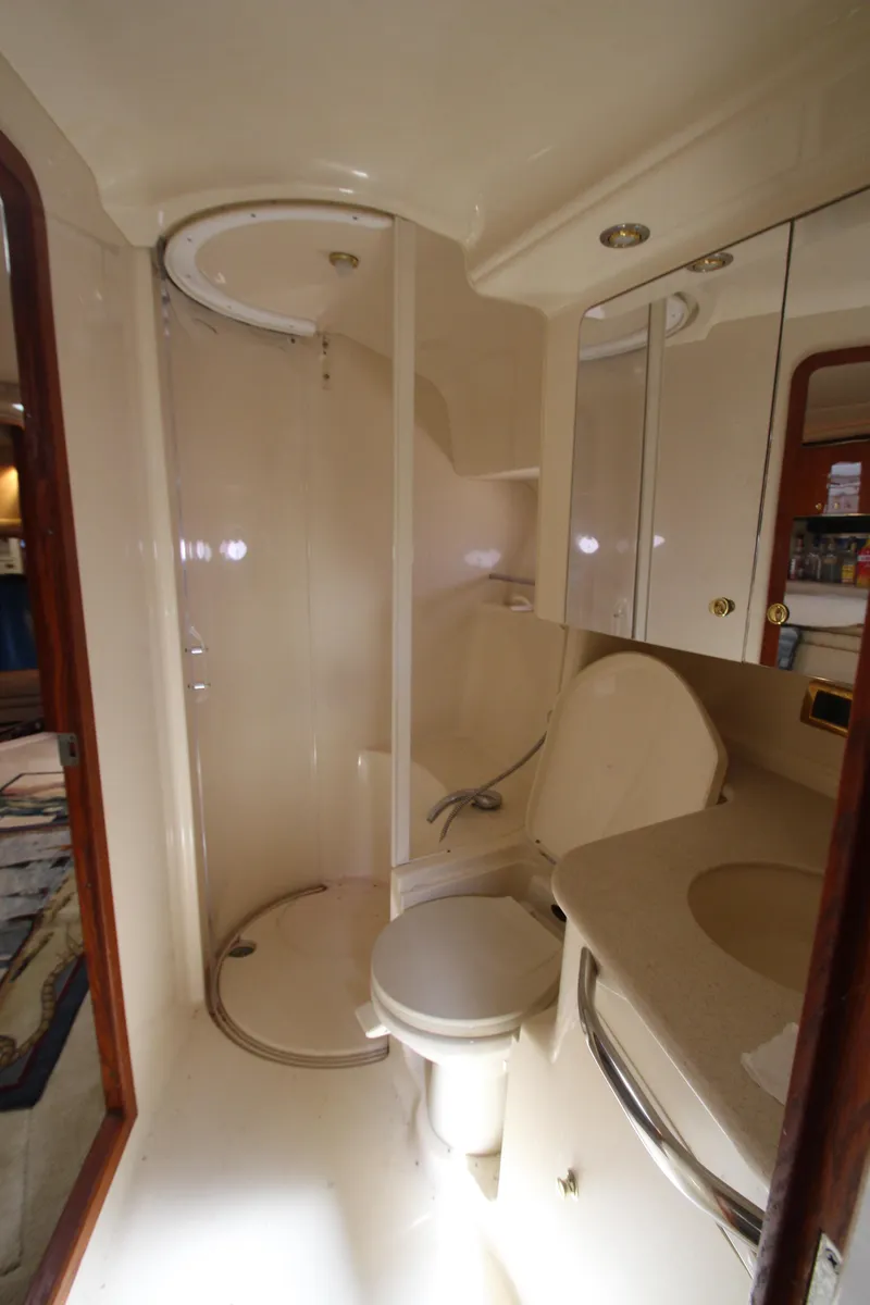 Slide: The Image of Luxurious bathroom in 2001 Sea Ray 460 Sundancer yacht with shower and toilet. - 36
