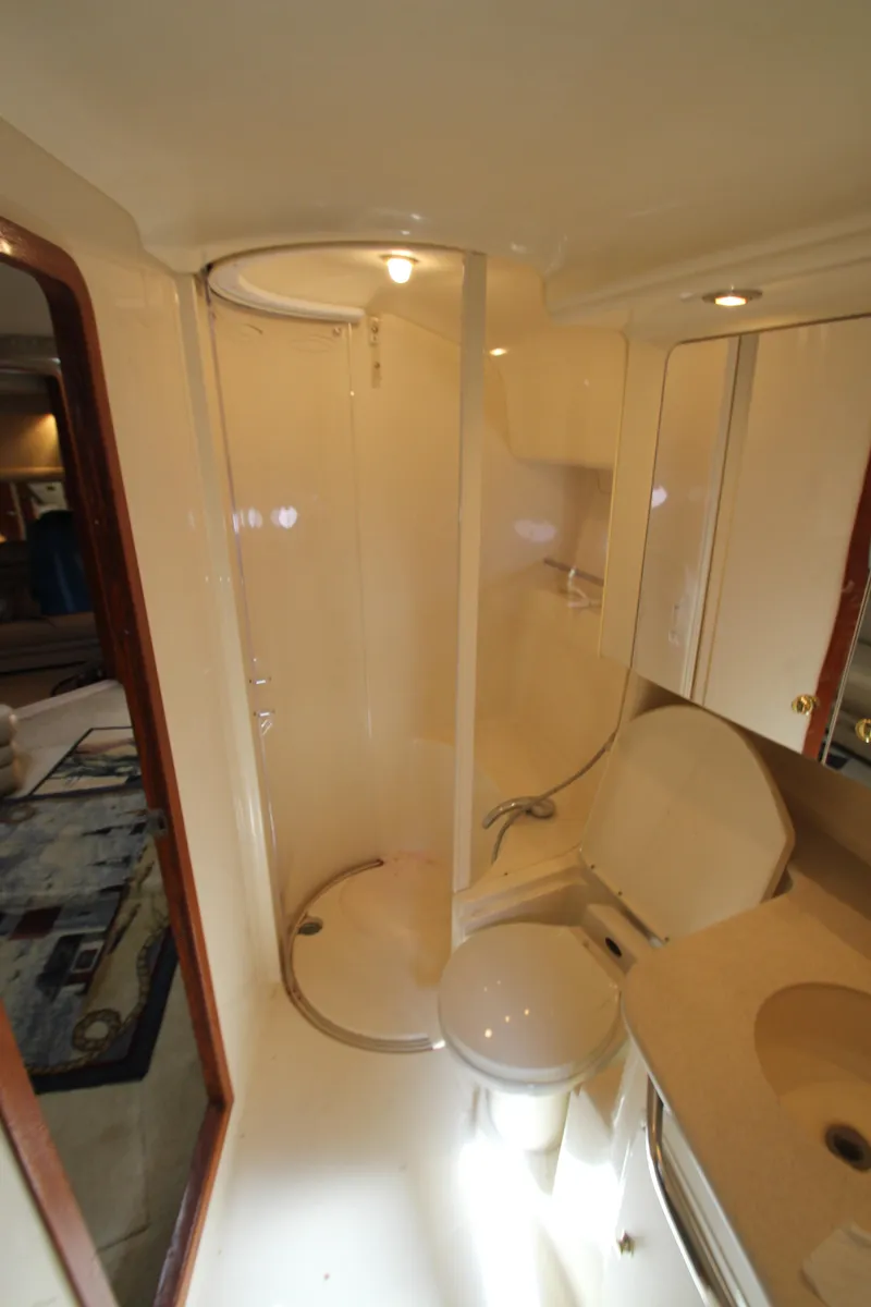Slide: The Image of 2001 Sea Ray 460 Sundancer yacht bathroom with shower and vanity. - 39
