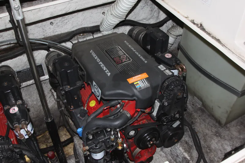 Slide: The Image of 2005 Rinker 312 Fiesta Vee engine compartment with Volvo Penta engine. - 35