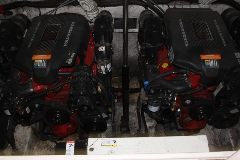 Slide: The Image of 2005 Rinker 312 Fiesta Vee engine compartment with dual Volvo Penta engines. - 36
