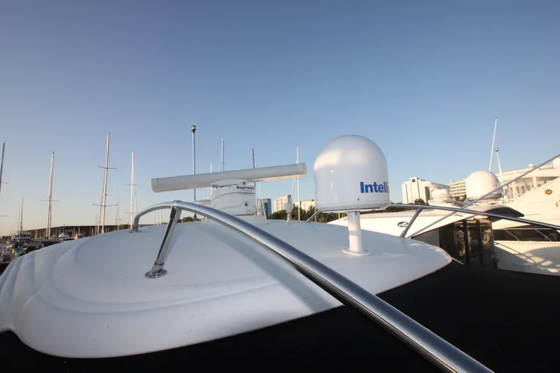 Slide: The Image of 2007 Sea Ray 44 Sundancer yacht with radar and satellite equipment on deck. - 13