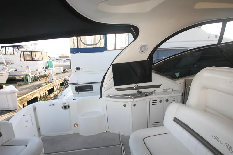 Slide: The Image of 2007 Sea Ray 44 Sundancer yacht interior with seating and entertainment area. - 21