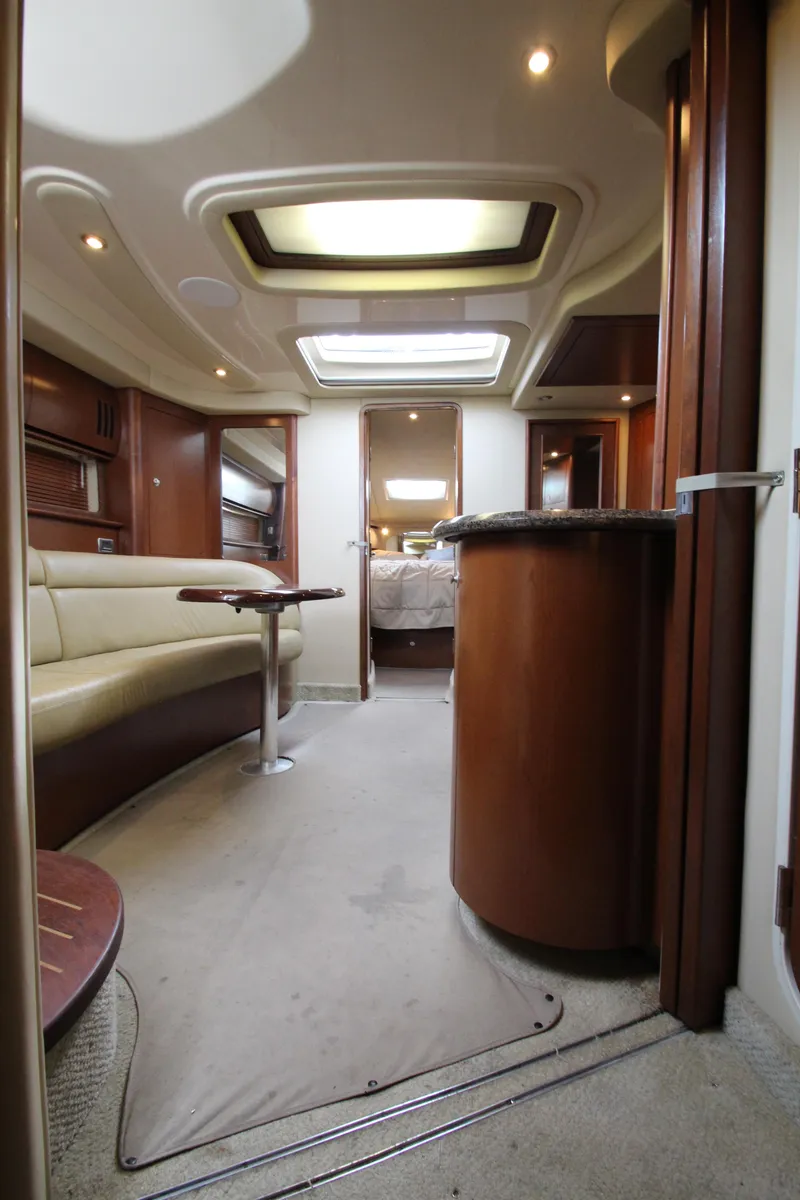 Slide: The Image of Interior of 2007 Sea Ray 44 Sundancer yacht, featuring elegant seating and modern design. - 44