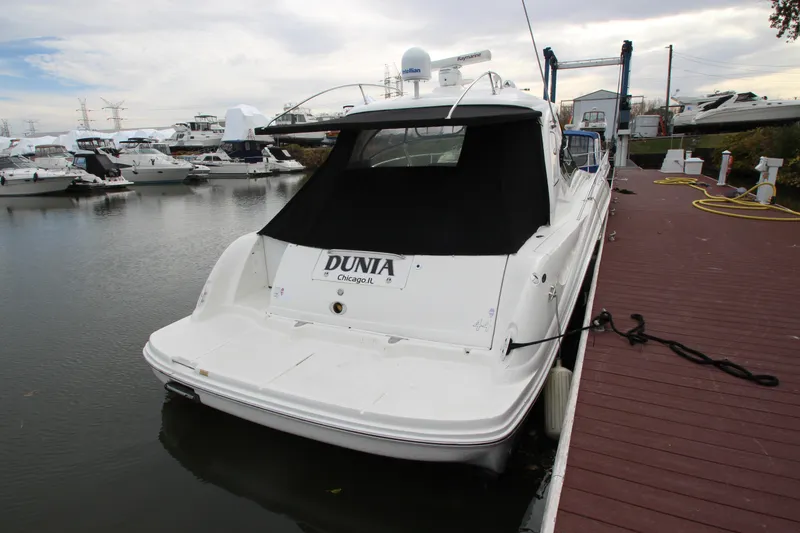 Slide: The Image of 2007 Sea Ray 44 Sundancer docked at marina, rear view. - 5