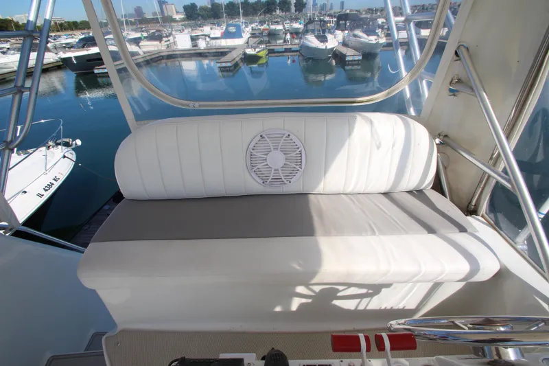 Slide: The Image of 1995 Mainship 31 Sedan Bridge boat interior with marina view. - 15