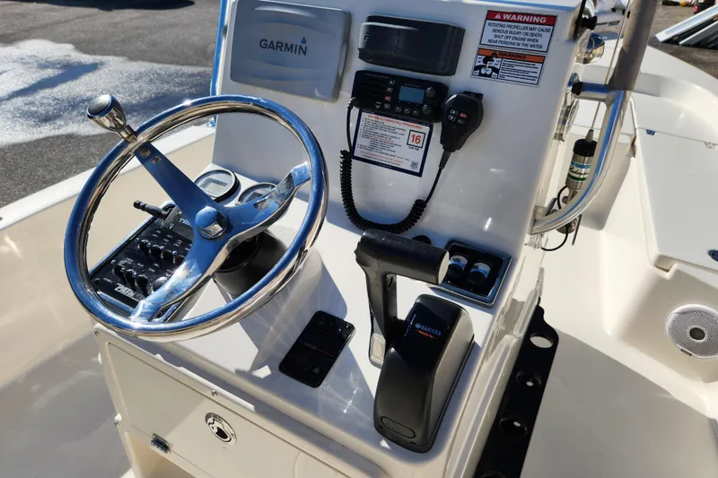 Slide: The Image of 2014 Pathfinder 2200 TRS boat console with Garmin navigation and Yamaha controls. - 11