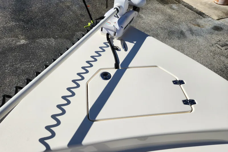 Slide: The Image of 2014 Pathfinder 2200 TRS boat deck with trolling motor and storage hatch. - 20