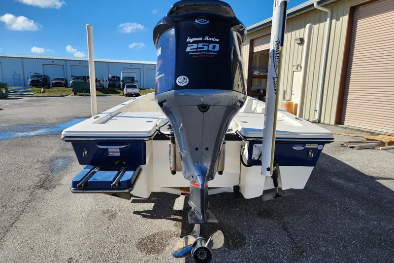 Slide: The Image of 2014 Pathfinder 2200 TRS boat with Yamaha 250 engine, parked outdoors. - 3