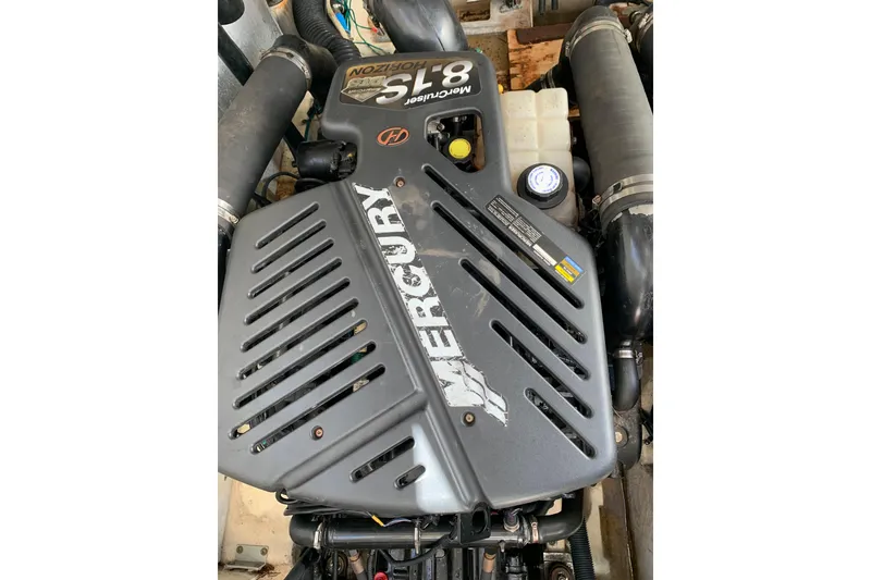 Slide: The Image of Engine of a 2008 Sea Ray 330 Sundancer boat, featuring a Mercury 8.1S Horizon. - 20
