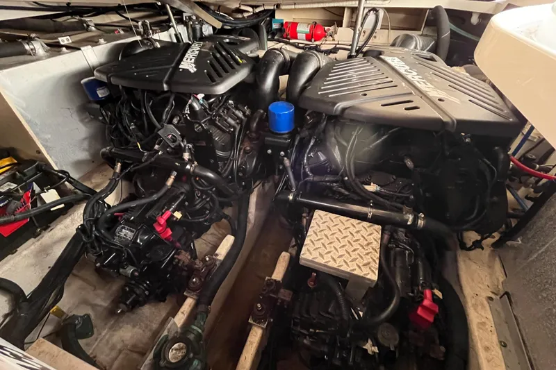 Slide: The Image of Engine compartment of a 2008 Sea Ray 330 Sundancer with dual MerCruiser engines. - 21