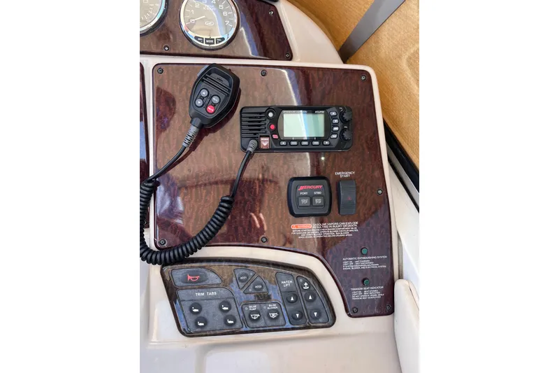 Slide: The Image of Control panel of 2008 Sea Ray 330 Sundancer boat with radio and gauges. - 30
