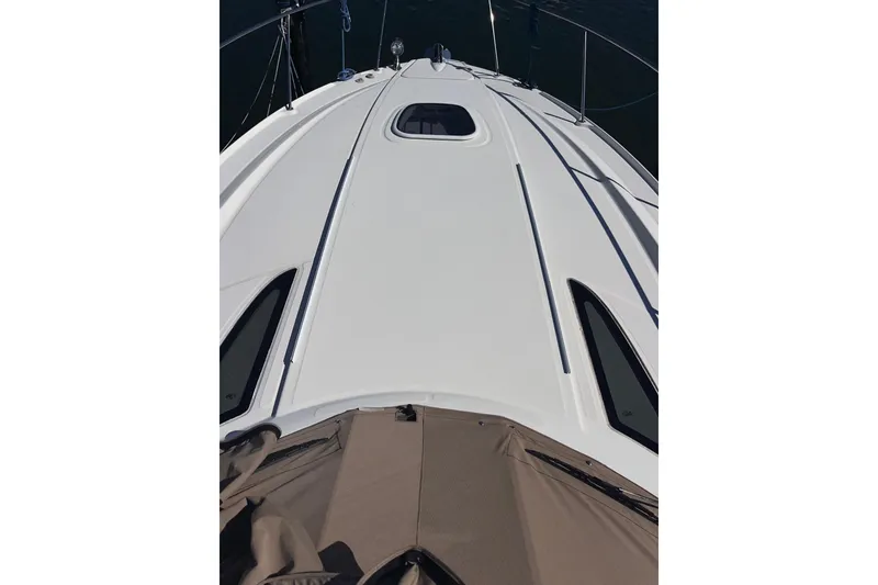 Slide: The Image of 2008 Sea Ray 330 Sundancer boat deck, featuring sleek design and modern lines. - 37