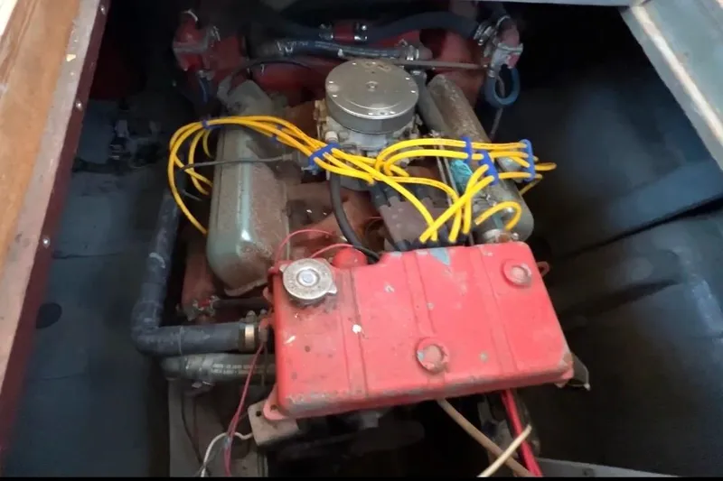 Slide: The Image of Engine of 1967 Chris-Craft 38 Constellation with yellow wires and red components. - 38