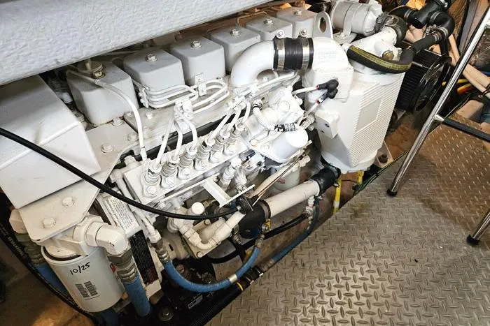 Slide: The Image of Engine room of 2006 Meridian 368 Motoryacht, showcasing detailed mechanical components. - 22