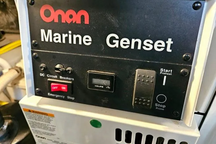 Slide: The Image of Onan marine generator control panel on 2006 Meridian 368 Motoryacht. - 25