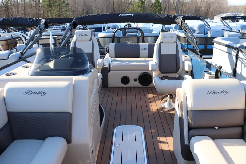 Slide: The Image of 2026 Bentley Pontoons 223 Elite Admiral interior with luxurious seating and sleek design. - 1
