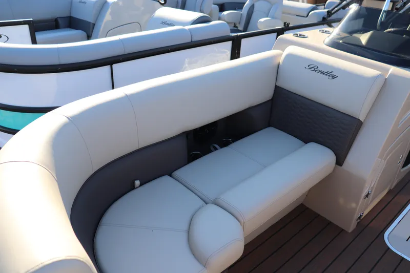 Slide: The Image of 2026 Bentley Pontoons 223 ELITE ADMIRAL interior with luxurious seating and elegant design. - 2
