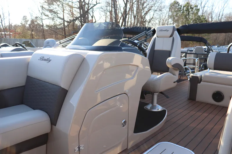 Slide: The Image of 2026 Bentley Pontoons 223 Elite Admiral interior with luxurious seating and modern design. - 4