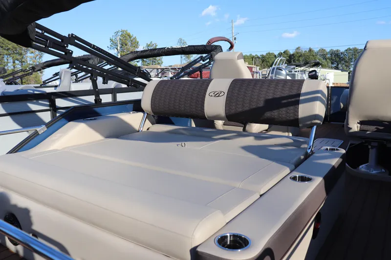 Slide: The Image of 2026 Bentley Pontoons 223 Elite Admiral with luxurious seating and cup holders. - 9