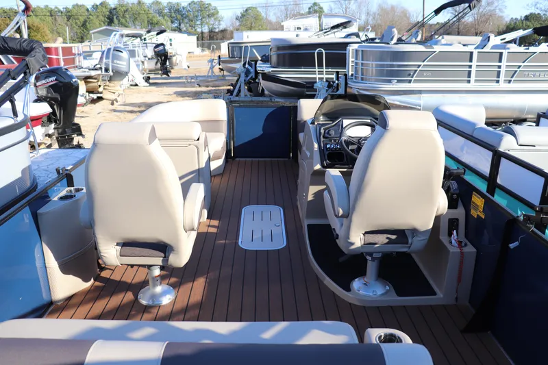 Slide: The Image of 2026 Bentley Pontoons 223 Elite Admiral interior with luxurious seating and modern dashboard. - 10