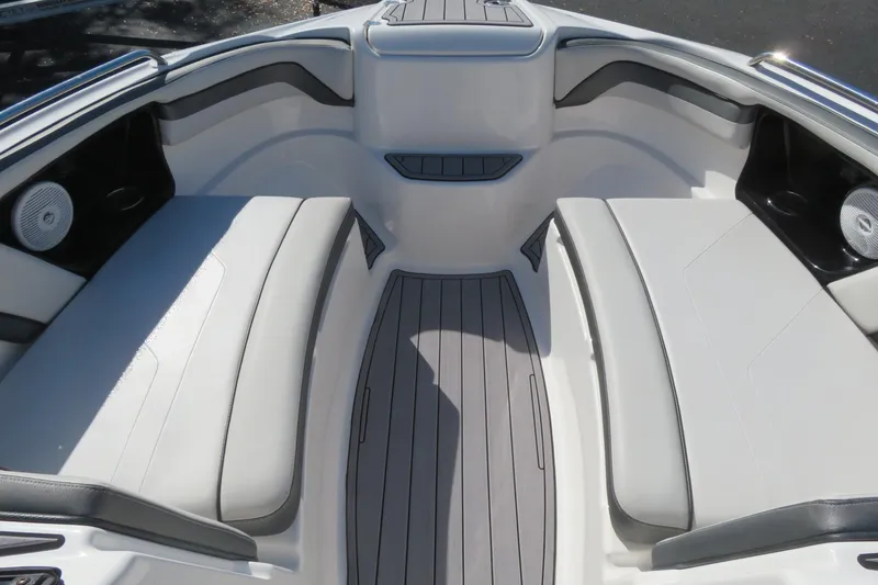 Slide: The Image of Red and white 2017 Yamaha AR240 boat hull on trailer, side view. - 10