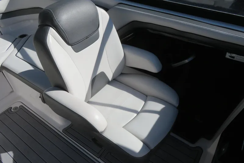 Slide: The Image of 2017 Yamaha Boats AR240 interior seating with speaker and storage compartment. - 19