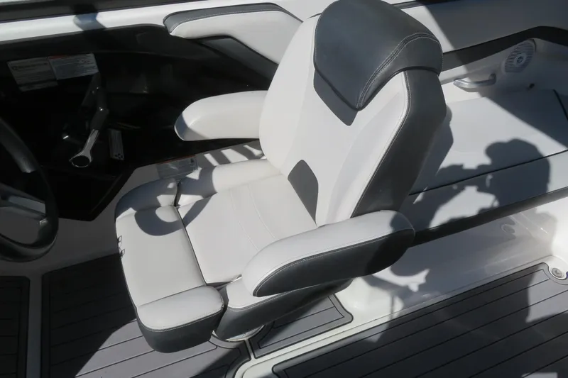 Slide: The Image of 2017 Yamaha Boats AR240 interior with sleek seating and modern dashboard design. - 22