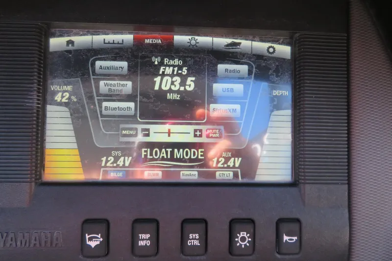 Slide: The Image of 2017 Yamaha Boats AR240 storage compartment with black finish and metal latch. - 34