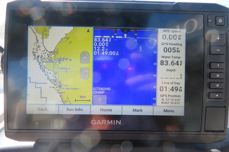 Slide: The Image of 2017 Yamaha AR240 boat dashboard with Garmin navigation system and steering wheel. - 35