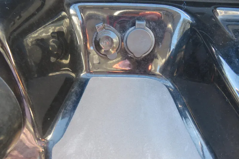 Slide: The Image of Dashboard display of a 2017 Yamaha Boats AR240 showing water temperature and system voltage. - 38