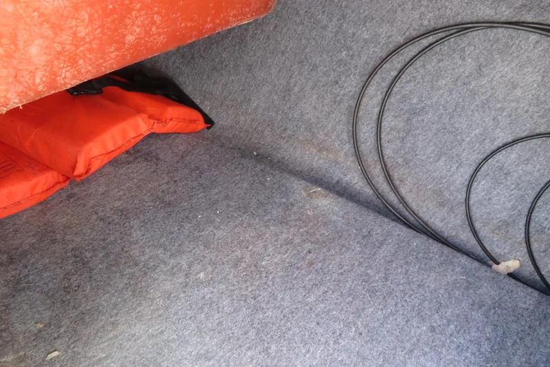 Slide: The Image of Throttle controls on a 2017 Yamaha Boats AR240, featuring safety warning labels. - 46