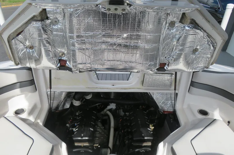 Slide: The Image of 2017 Yamaha Boats AR240 engine compartment with insulation visible. - 59