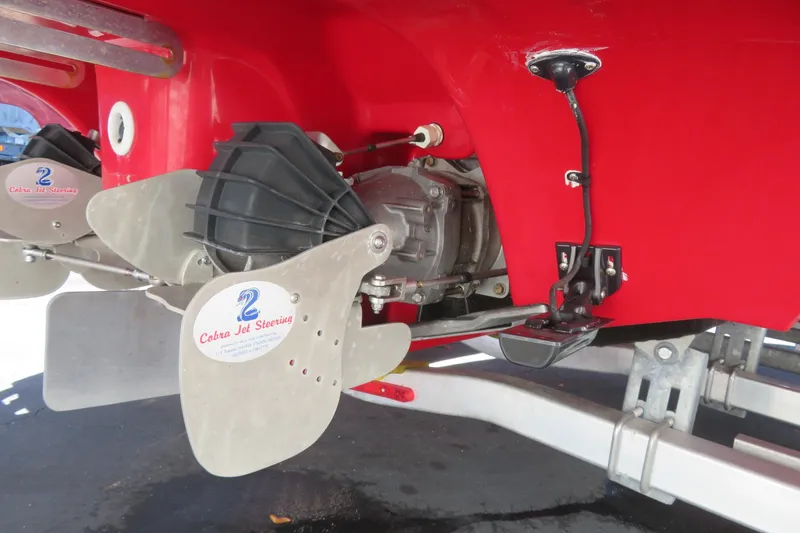 Slide: The Image of 2017 Yamaha Boats AR240 on trailer, sleek design, parked outdoors under blue sky. - 6