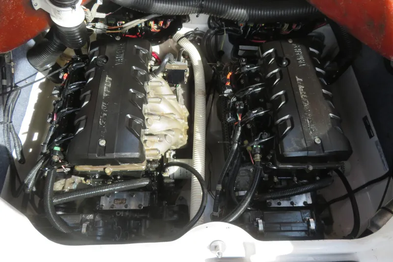 Slide: The Image of 2017 Yamaha Boats AR240 engine compartment with dual engines and wiring. - 60